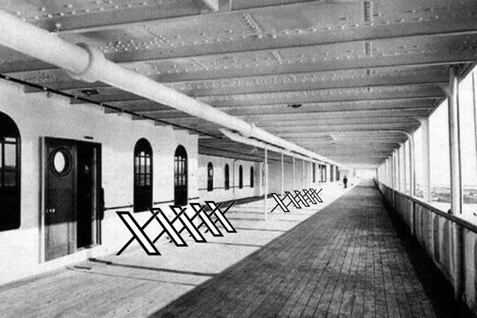The promenade deck of the Titanic. The deck chairs are oddly 'X' shaped.